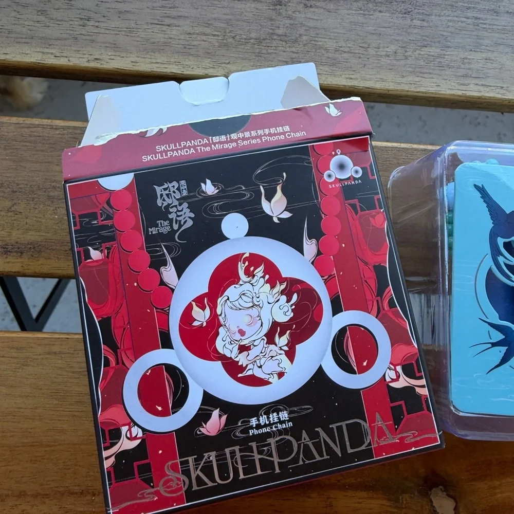 Scullpanda phone wristlet